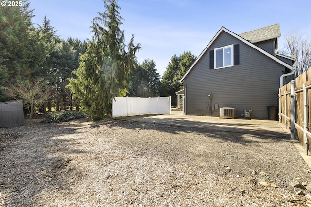 16405 NE 38th St, Vancouver, WA 98682 - view of home's exterior with cooling unit and a shingled roof
