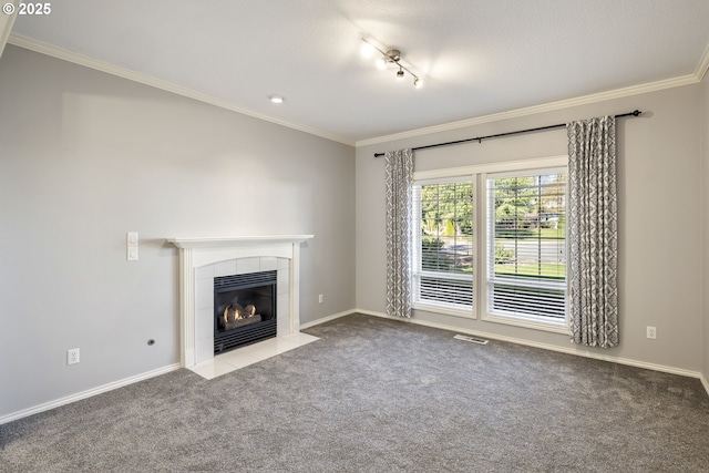 unfurnished living room with carpet floors, ornamental molding, and visible vents