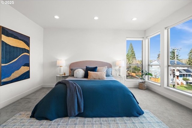 bedroom featuring recessed lighting, carpet flooring, and baseboards