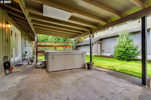 view of patio / terrace featuring a hot tub