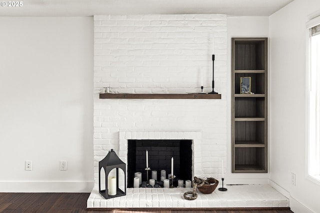 4844 SW Wembley Pl, Beaverton, OR 97005 - detailed view of wood finished floors and a fireplace