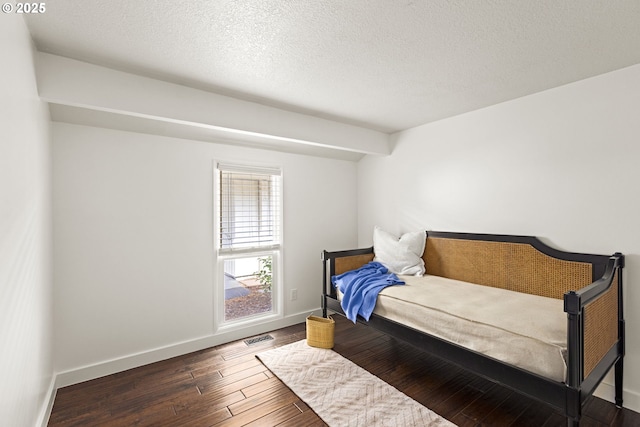 4844 SW Wembley Pl, Beaverton, OR 97005 - bedroom featuring wood finished floors and a textured ceiling
