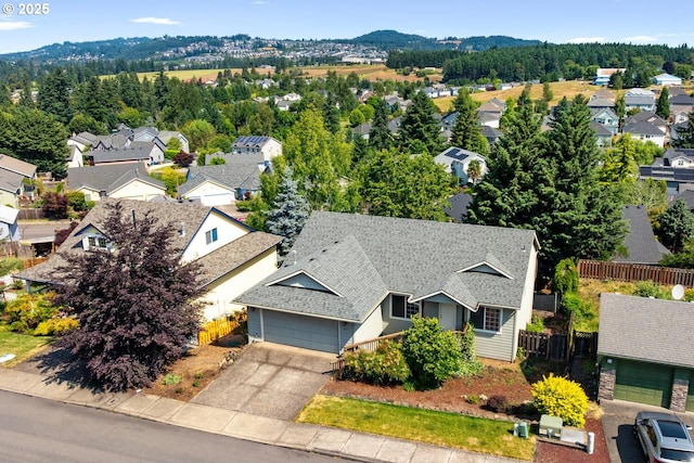16917 SE Dunhill Loop, Damascus, OR 97089 - aerial perspective of suburban area featuring a mountainous background