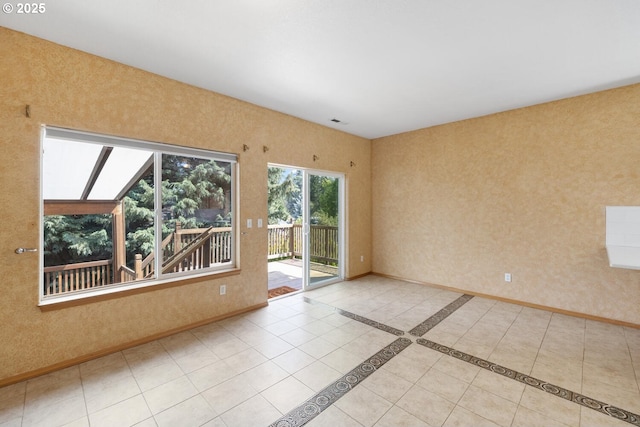 16917 SE Dunhill Loop, Damascus, OR 97089 - unfurnished room with baseboards and tile patterned floors