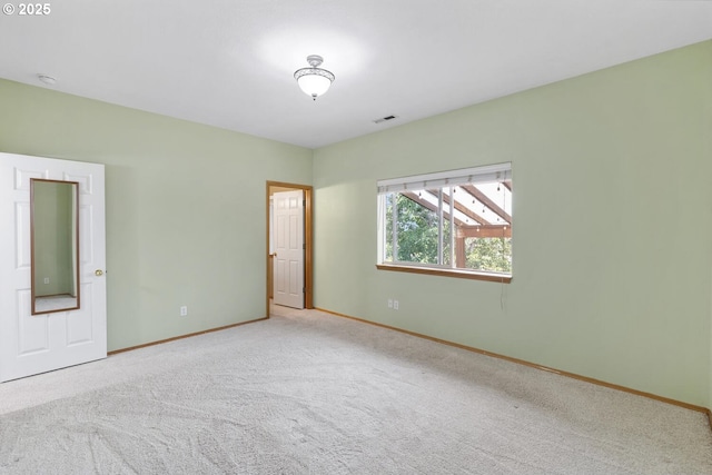 16917 SE Dunhill Loop, Damascus, OR 97089 - carpeted spare room featuring baseboards and a smoke detector