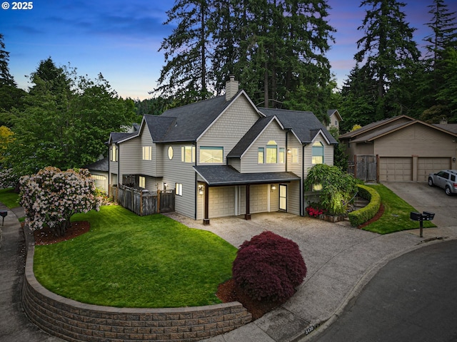 3430 Breezewood Ave, Eugene, OR 97405 - view of front of house with a chimney, a garage, roof with shingles, driveway, and an outbuilding
