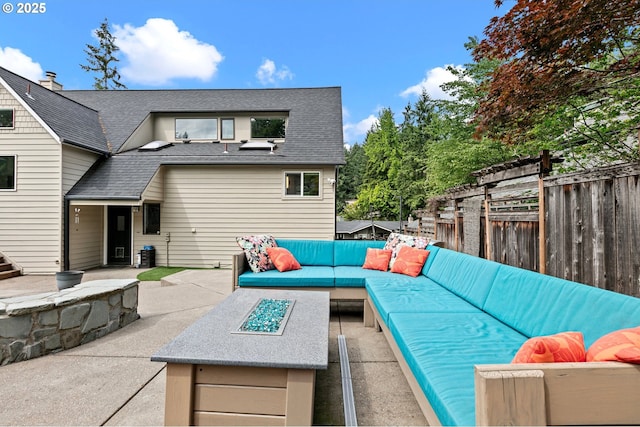 3430 Breezewood Ave, Eugene, OR 97405 - fenced backyard with an outdoor living space with a fire pit and a patio