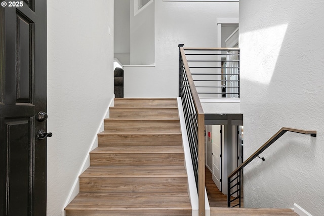 3430 Breezewood Ave, Eugene, OR 97405 - stairway with a textured wall and wood finished floors