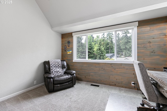 3430 Breezewood Ave, Eugene, OR 97405 - living area featuring wood walls, lofted ceiling, and carpet floors