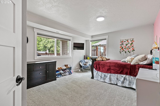 3430 Breezewood Ave, Eugene, OR 97405 - carpeted bedroom featuring a textured ceiling