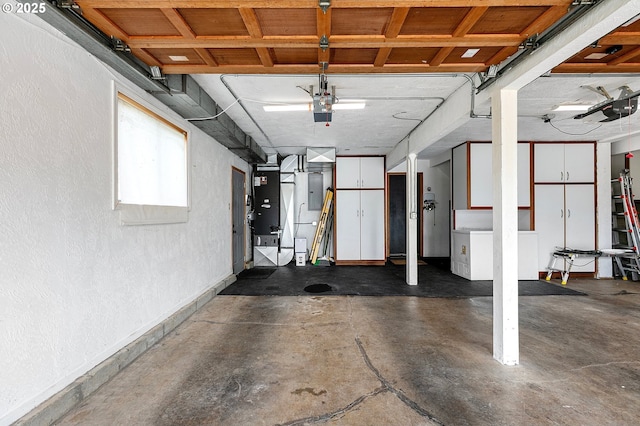 3430 Breezewood Ave, Eugene, OR 97405 - garage featuring a textured wall and a garage door opener