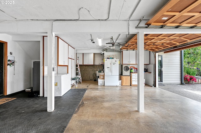 3430 Breezewood Ave, Eugene, OR 97405 - garage with white fridge with ice dispenser and washer / clothes dryer
