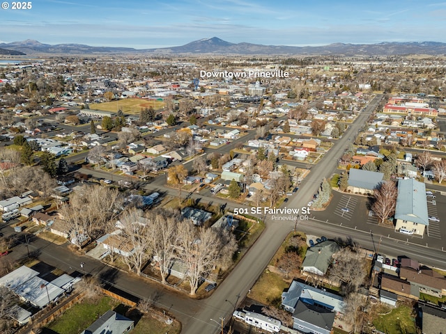 drone / aerial view featuring a mountain view