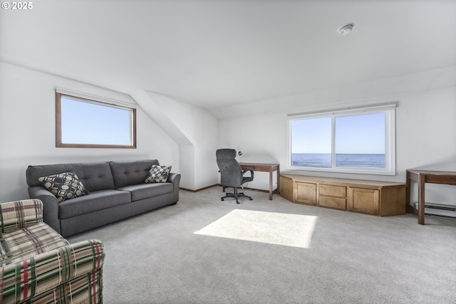 carpeted office featuring a water view, lofted ceiling, and a baseboard heating unit