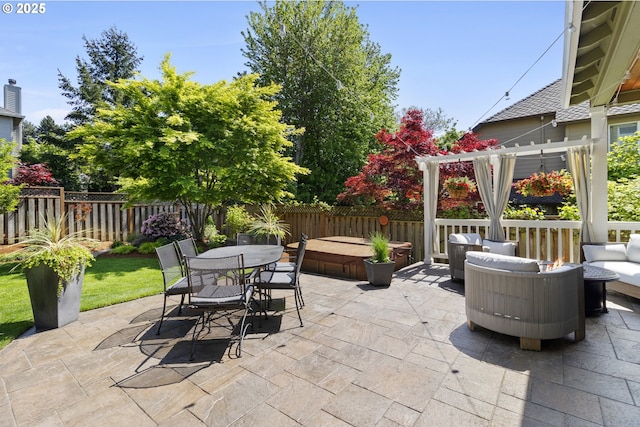 view of patio with outdoor lounge area, a pergola, a fenced backyard, and outdoor dining space