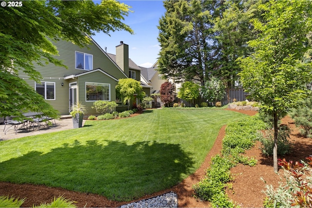 view of yard with a patio area