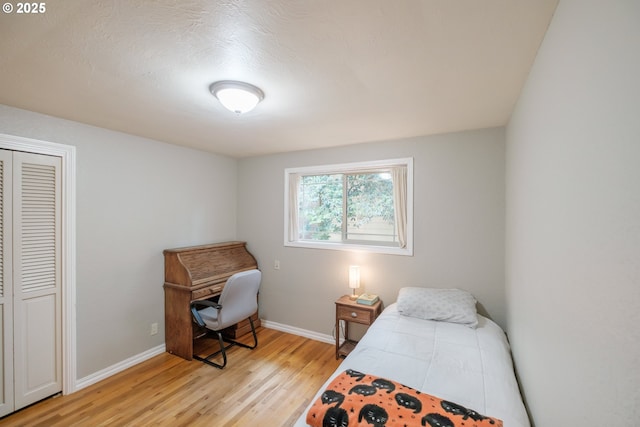 4635 18th Pl S, Salem, OR 97302 - bedroom with light wood finished floors, baseboards, and a closet