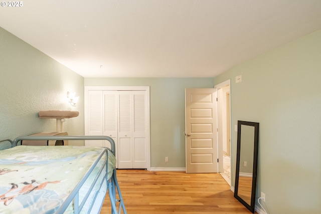 4635 18th Pl S, Salem, OR 97302 - bedroom featuring light wood finished floors, a closet, and baseboards