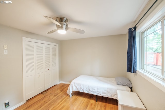 4635 18th Pl S, Salem, OR 97302 - bedroom featuring light wood-type flooring, a closet, baseboards, and a ceiling fan