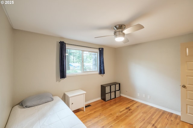 4635 18th Pl S, Salem, OR 97302 - bedroom with light wood finished floors, baseboards, and a ceiling fan