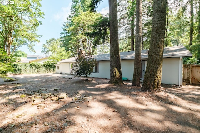 4635 18th Pl S, Salem, OR 97302 - rear view of property featuring stucco siding and a chimney