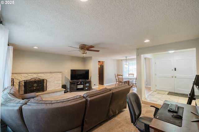 4635 18th Pl S, Salem, OR 97302 - living area featuring a textured ceiling, recessed lighting, ceiling fan, and light colored carpet