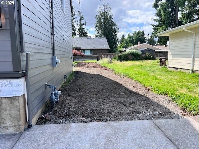view of yard with fence