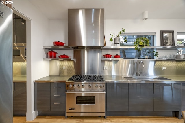 3419 SE Woodward St, Portland, OR 97202 - kitchen featuring stainless steel countertops, premium range, wall chimney exhaust hood, open shelves, and modern cabinets