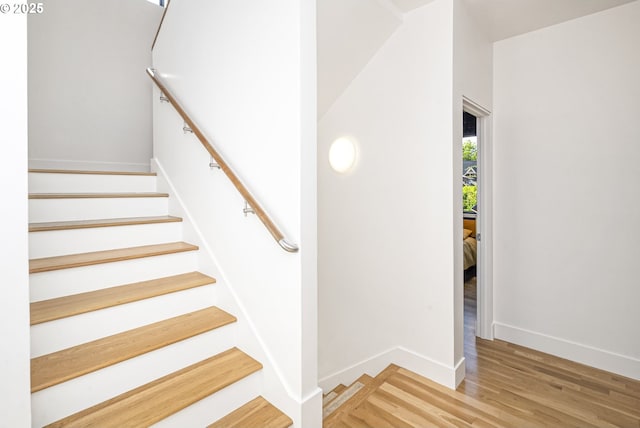 3419 SE Woodward St, Portland, OR 97202 - stairway with wood finished floors and baseboards