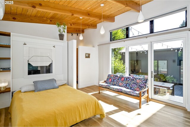 3419 SE Woodward St, Portland, OR 97202 - bedroom with wood finished floors, access to exterior, and a wood ceiling with exposed beams