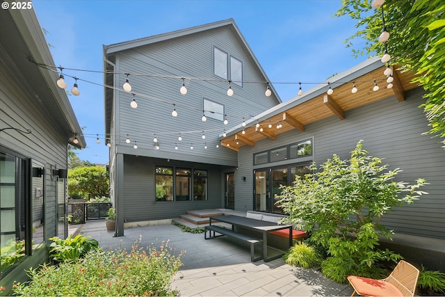 3419 SE Woodward St, Portland, OR 97202 - back of house with a patio