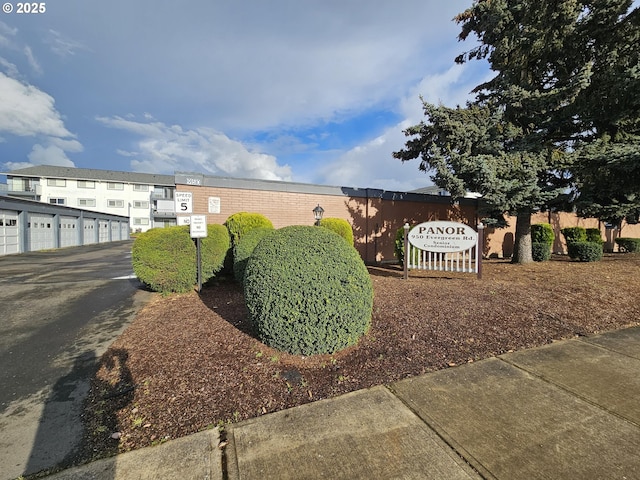 950 Evergreen Rd Unit 207, Woodburn, OR 97071 - view of side of property with community garages and brick siding