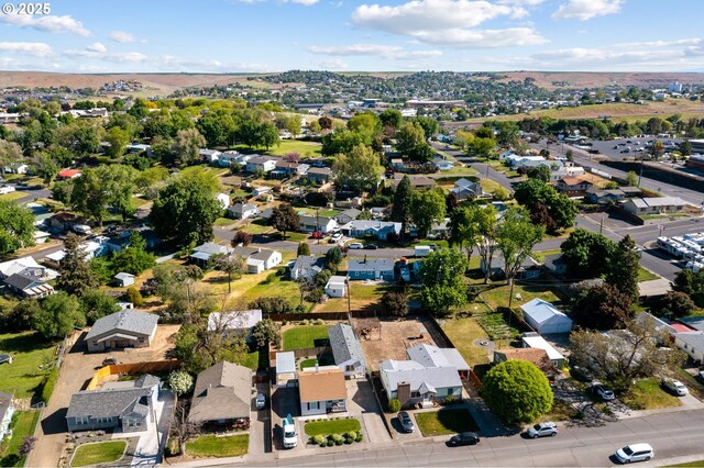 aerial overview of property's location with nearby suburban area