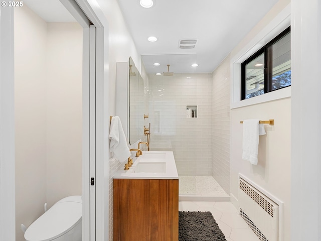 3440 SW 100th Ave, Portland, OR 97225 - bathroom with walk in shower, tile patterned floors, double vanity, radiator heating unit, and recessed lighting