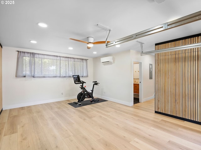 3440 SW 100th Ave, Portland, OR 97225 - exercise room featuring a wall unit AC, recessed lighting, wood finished floors, a ceiling fan, and electric panel