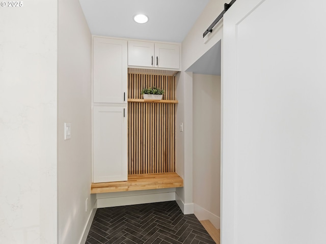 3440 SW 100th Ave, Portland, OR 97225 - mudroom featuring a barn door and recessed lighting