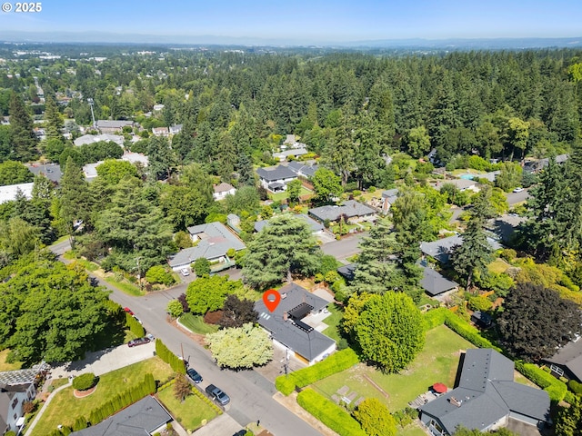 3440 SW 100th Ave, Portland, OR 97225 - aerial perspective of suburban area featuring a heavily wooded area