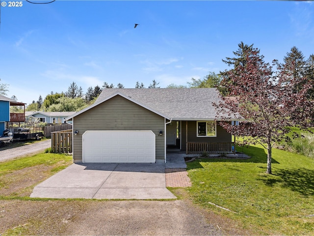 ranch-style house with fence, a shingled roof, a front lawn, a porch, and concrete driveway