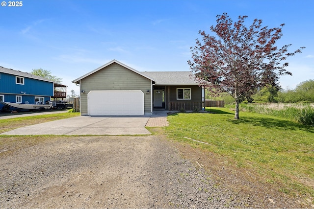 ranch-style house with an attached garage, driveway, and a front lawn