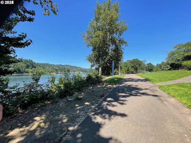 view of street with a water view