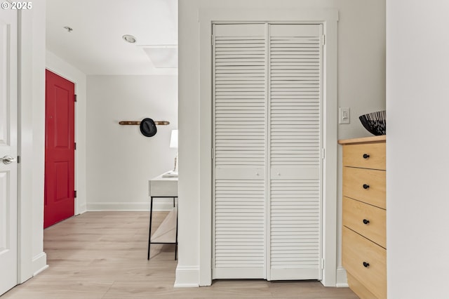 hallway featuring light hardwood / wood-style flooring