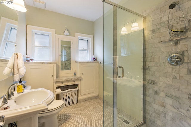 4349 NE Glisan St, Portland, OR 97213 - full bathroom with a shower stall, a sink, and toilet