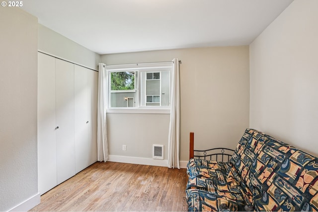 6610 SW Terri Ct Unit 10, Portland, OR 97225 - sitting room with wood finished floors and baseboards