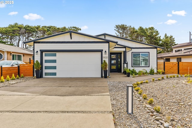 5820 El Mar Ave, Lincoln City, OR 97367 - view of front of property with concrete driveway and a garage