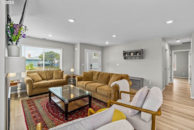5820 El Mar Ave, Lincoln City, OR 97367 - living area featuring recessed lighting, baseboards, and light wood-type flooring