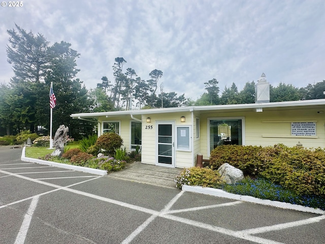 5820 El Mar Ave, Lincoln City, OR 97367 - view of front of property featuring a chimney
