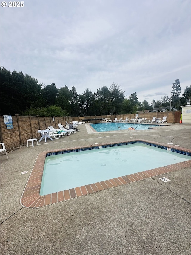 5820 El Mar Ave, Lincoln City, OR 97367 - community pool featuring a patio area