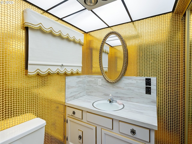 6002 E Evergreen Blvd, Vancouver, WA 98661 - bathroom with vanity, backsplash, and tile walls