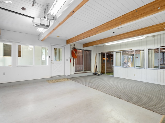 6002 E Evergreen Blvd, Vancouver, WA 98661 - garage featuring a garage door opener and wooden walls