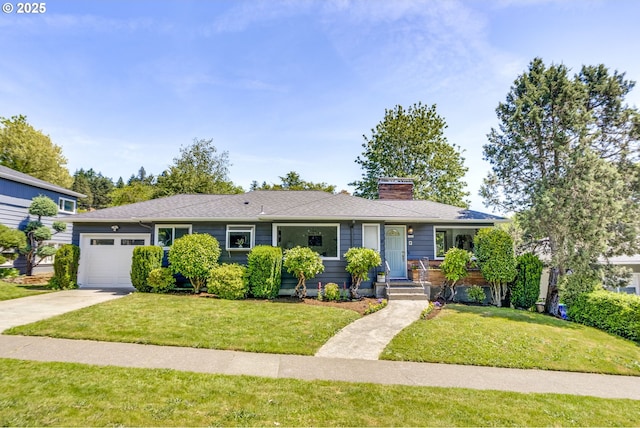 6220 SW 45th Ave, Portland, OR 97221 - view of front of house with an attached garage, a chimney, a front yard, and concrete driveway